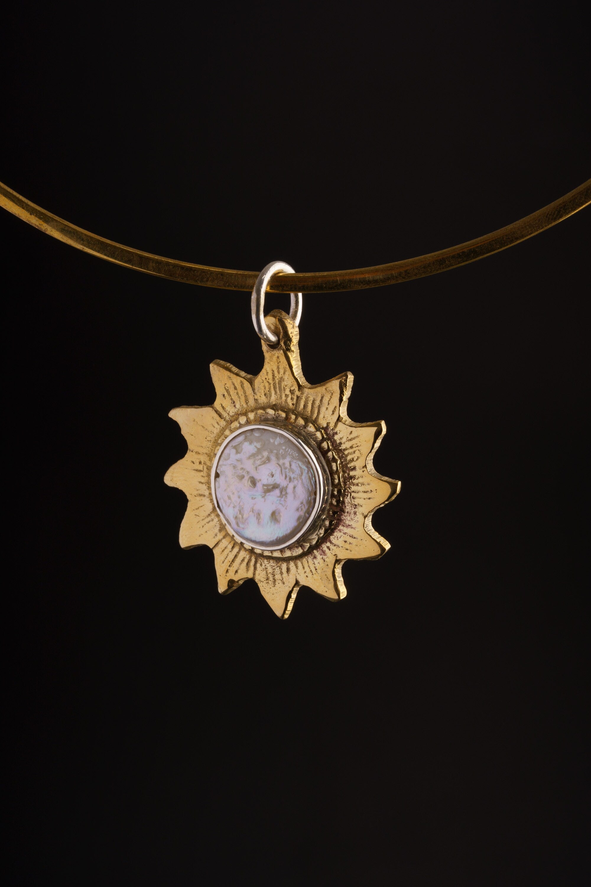Lustrous Sunburst Pendant: Mother-of-Pearl Stone - Gold-toned Brass Pendant