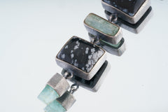 Celestial Harmony: Raw Australian Gem Grade Emerald, Dalmatian Jasper and Aquamarine - Sterling Silver Pendant