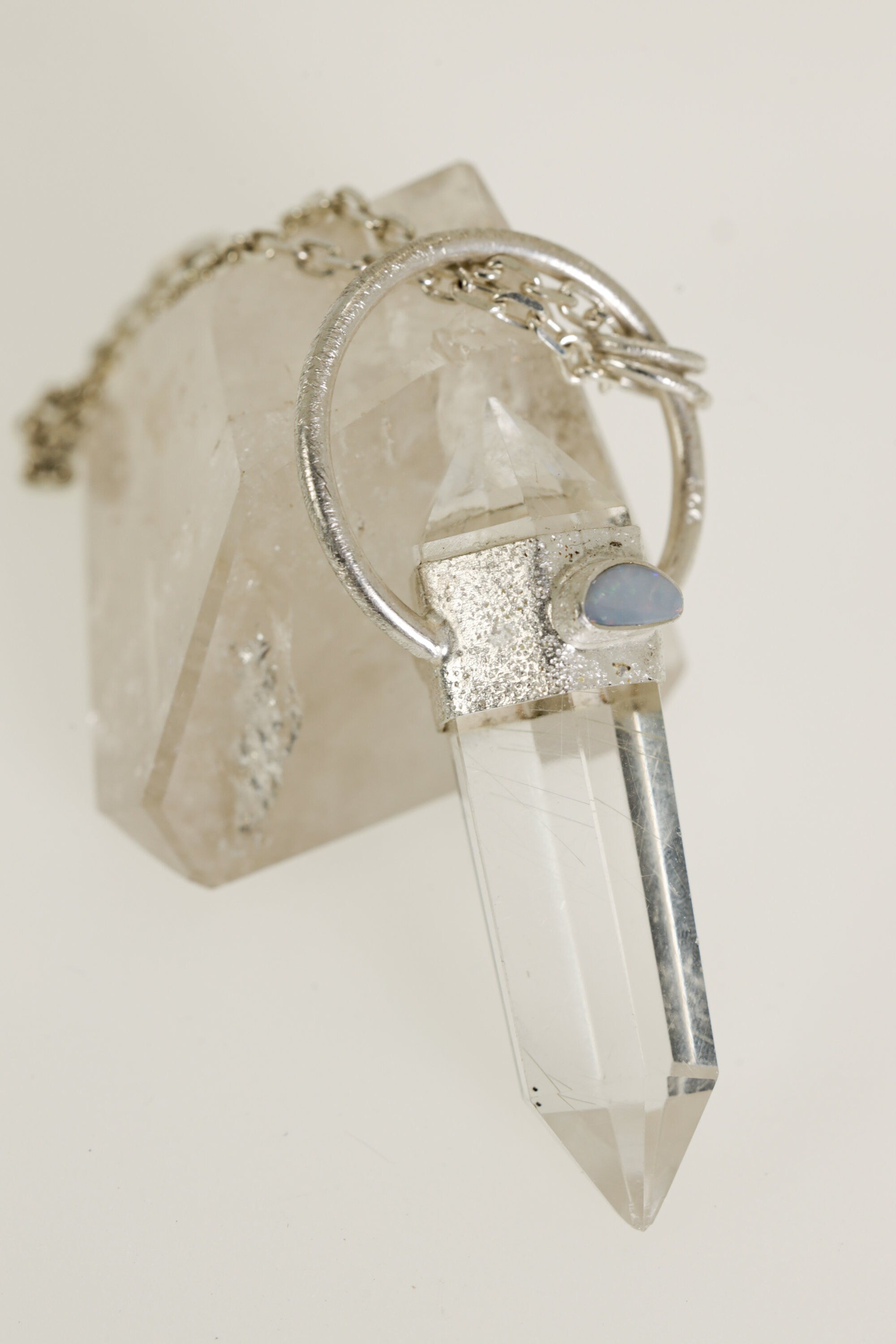 Luminous Gateway: Sterling Silver Sand-Textured Crystal Pendant with Double Terminated Clear White Rutile Quartz and Opal